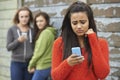 Teenage Girl Being Bullied By Text Message Royalty Free Stock Photo