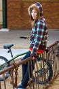 Teenage Girl on Bike Rack Royalty Free Stock Photo