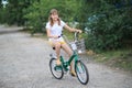 Teenage girl with a bike-riding Royalty Free Stock Photo