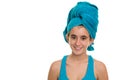Teenage girl with a blue towel wrapped over her wet hair Royalty Free Stock Photo