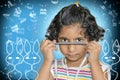 Teenage girl child with pencil in hands