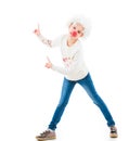 Teenage girl in clown wig pointing up Royalty Free Stock Photo