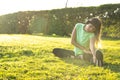 Teenage girl doing stretching exercises in park Royalty Free Stock Photo