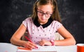 Teenage girl drawing with colorful pencils