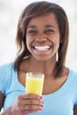 Teenage Girl Drinking Fresh Orange Juice