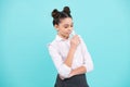 Teenage girl drinking water from glass isolated on blue background. Daily life health. Happy teenager, positive and Royalty Free Stock Photo