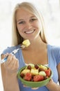 Teenage Girl Eating Fresh Fruit Salad Royalty Free Stock Photo