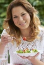 Teenage Girl Eating Healthy Bowl Of Salad Royalty Free Stock Photo