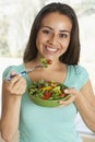 Teenage Girl Eating A Salad Royalty Free Stock Photo