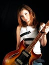 Teenage girl with electric guitar Royalty Free Stock Photo