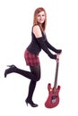 Teenage girl with an electric guitar on white back Royalty Free Stock Photo