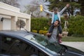 Teenage girl and father washing a car Royalty Free Stock Photo