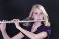 Teenage Girl Flute Player On Black Royalty Free Stock Photo