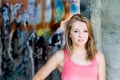 Teenage Girl Graffiti wall in background Royalty Free Stock Photo