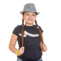 Teenage girl in a hat twitches his braids , close Royalty Free Stock Photo
