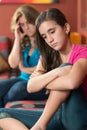 Teenage girl with her sad and worried mother Royalty Free Stock Photo