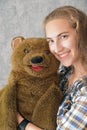 Teenage girl and her teddy bear Royalty Free Stock Photo