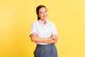 teenage girl in high school uniform standing with arms crossed Royalty Free Stock Photo