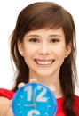 Teenage girl holding alarm clock Royalty Free Stock Photo