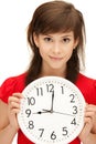 Teenage girl holding big clock Royalty Free Stock Photo