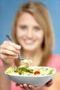 Teenage Girl Holding Bowl Of Salad Royalty Free Stock Photo