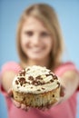 Teenage Girl Holding Cream Cake Royalty Free Stock Photo