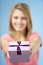 Teenage Girl Holding Gift Wrapped Box Royalty Free Stock Photo