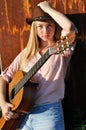 Teenage girl holding guitar Royalty Free Stock Photo