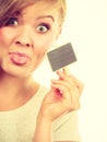 Teenage girl holding little school blackboards