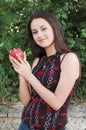 Teenage girl holding red apple Royalty Free Stock Photo