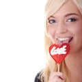 Teenage girl holding red lollipop Royalty Free Stock Photo