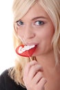 Teenage girl holding red lollipop Royalty Free Stock Photo