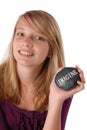 Teenage girl holding rock with word Imagine Royalty Free Stock Photo