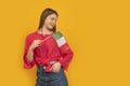 Teenage girl holds the flag of Italy. Studio photo. Student Exchange Program. Travels to Italy. Copy space