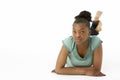 Teenage Girl Laying On Stomach Royalty Free Stock Photo