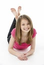 Teenage Girl Laying on Stomach Royalty Free Stock Photo