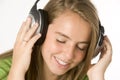 Teenage Girl Listening To Music On Headphones Royalty Free Stock Photo