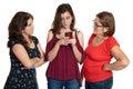 Teenage girl looking at her cellphone while her worried mother and grandmother look at her Royalty Free Stock Photo