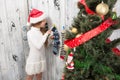Teenage girl looking into New Year and Christmas socks Royalty Free Stock Photo