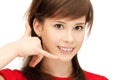 Teenage girl making a call me gesture Royalty Free Stock Photo