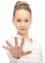 Teenage girl making stop gesture Royalty Free Stock Photo