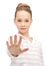 Teenage girl making stop gesture Royalty Free Stock Photo