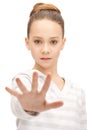 Teenage girl making stop gesture Royalty Free Stock Photo