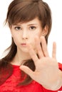 Teenage girl making stop gesture Royalty Free Stock Photo