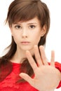 Teenage girl making stop gesture Royalty Free Stock Photo