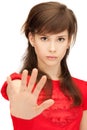 Teenage girl making stop gesture Royalty Free Stock Photo