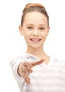 Teenage girl with an open hand ready for handshake Royalty Free Stock Photo