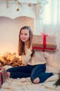 Teenage girl opening the present Royalty Free Stock Photo