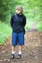 Teenage girl in the park on the path Royalty Free Stock Photo