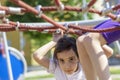 Little beginner school girl playing at playground